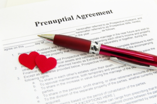prenuptial agreement with two red hearts